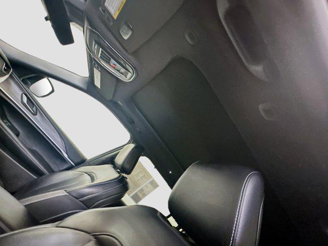 Photo of 2024 Diamond Black Crystal Pearlcoat Jeep Grand Cherokee L