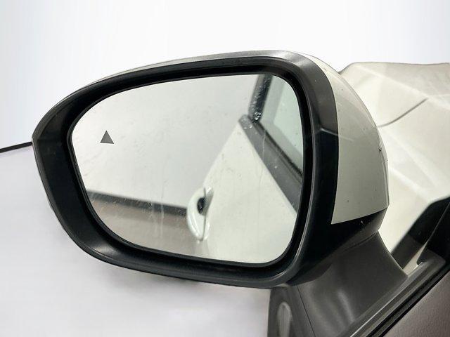 Photo of 2023 Pearl White Tricoat Nissan Rogue