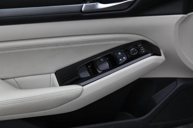 Photo of 2023 Garnet Pearl Nissan Altima