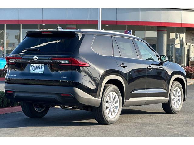 Photo of 2025 Midnight Black Metallic Toyota Grand Highlander Hybrid