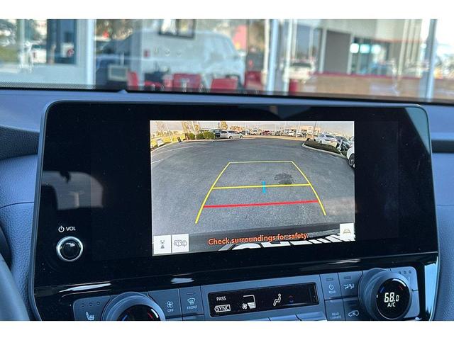 Photo of 2025 Midnight Black Metallic Toyota Grand Highlander Hybrid