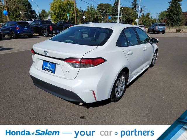 Photo of 2023 WHI/White Toyota Corolla