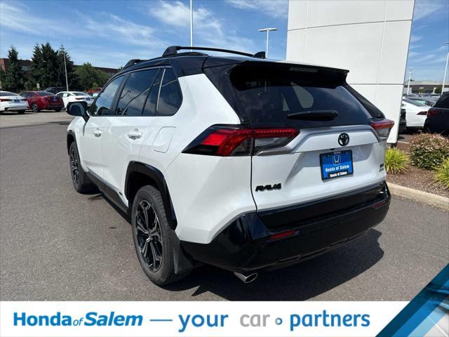 Photo of 2025 Wind Chill Pearl/Midnight Black Metallic Toyota RAV4 Hybrid