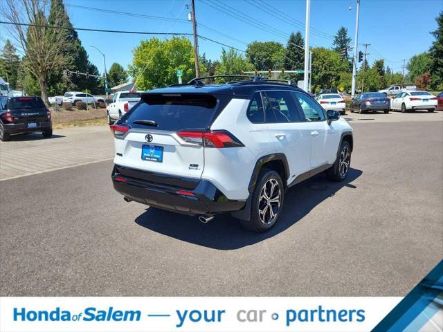 Photo of 2025 Wind Chill Pearl/Midnight Black Metallic Toyota RAV4 Hybrid