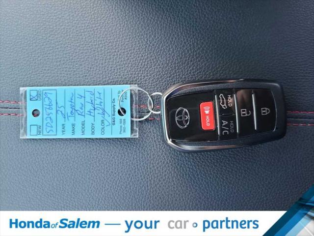 Photo of 2025 Wind Chill Pearl/Midnight Black Metallic Toyota RAV4 Hybrid