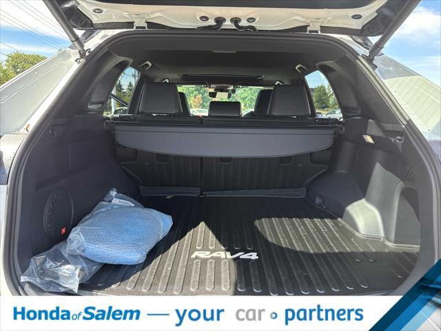 Photo of 2025 Wind Chill Pearl/Midnight Black Metallic Toyota RAV4 Hybrid