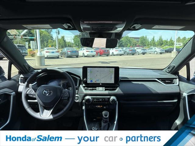 Photo of 2025 Wind Chill Pearl/Midnight Black Metallic Toyota RAV4 Hybrid