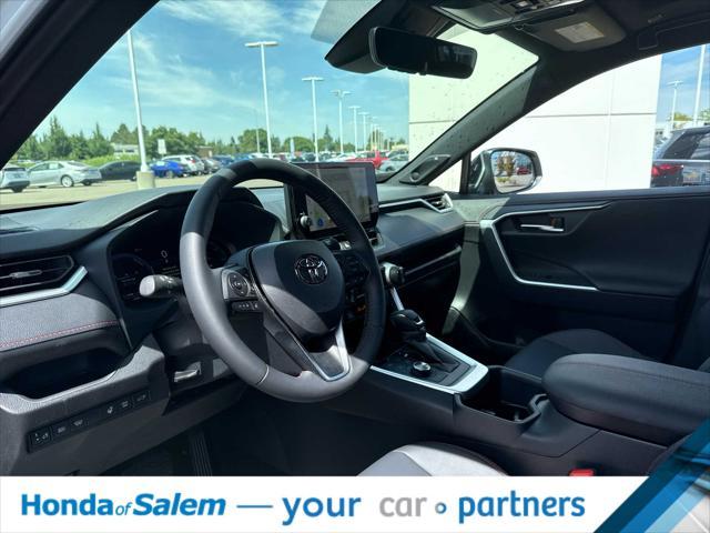 Photo of 2025 Wind Chill Pearl/Midnight Black Metallic Toyota RAV4 Hybrid