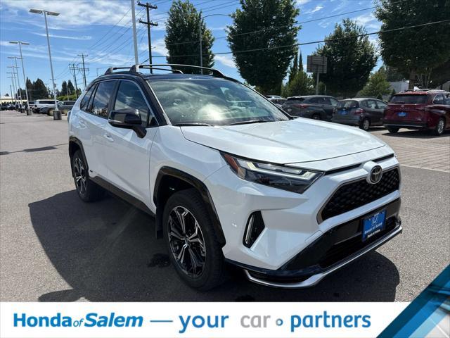 Photo of 2025 Wind Chill Pearl/Midnight Black Metallic Toyota RAV4 Hybrid