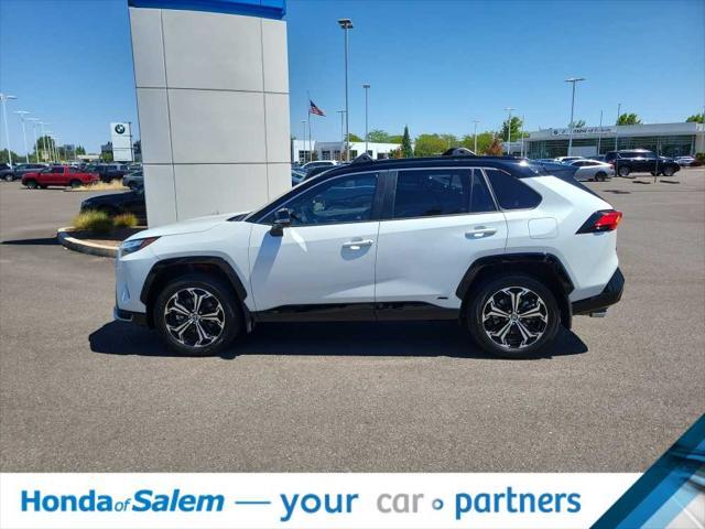 Photo of 2025 Wind Chill Pearl/Midnight Black Metallic Toyota RAV4 Hybrid