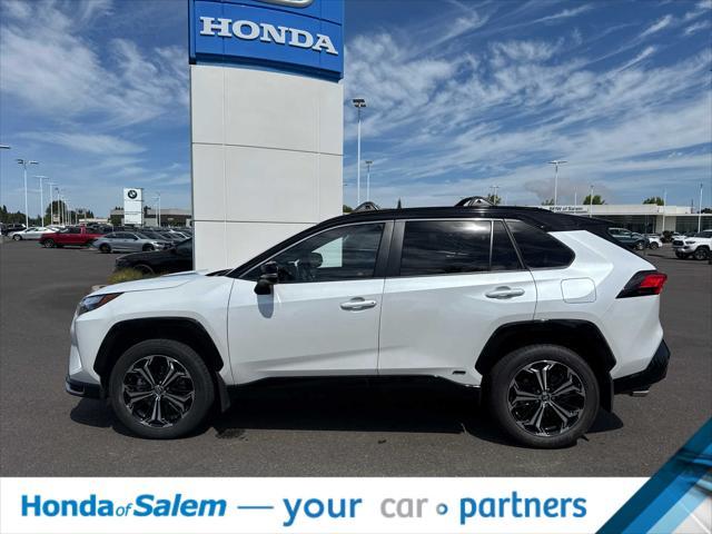Photo of 2025 Wind Chill Pearl/Midnight Black Metallic Toyota RAV4 Hybrid