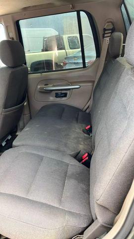 Photo of 2002 Estate Green Clearcoat Metallic Ford Explorer Sport Trac