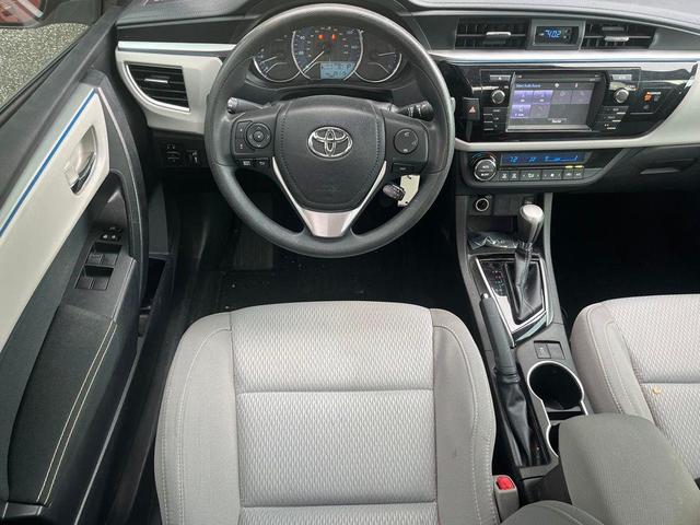 Photo of 2016 Barcelona Red Metallic Toyota Corolla
