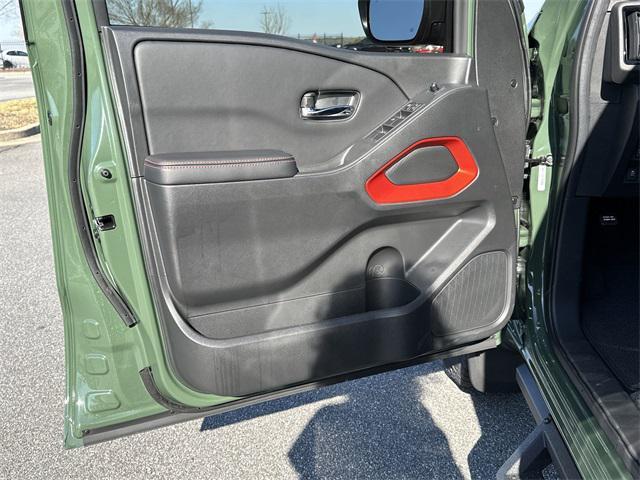 Photo of 2025 Tactical Green Metallic Nissan Frontier