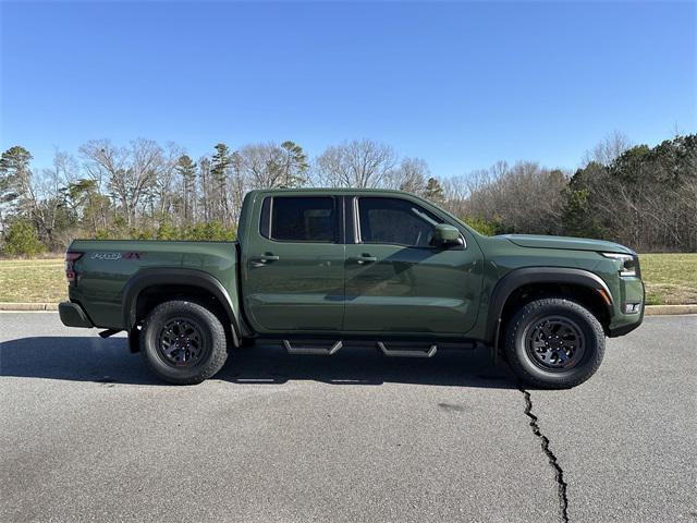 Photo of 2025 Tactical Green Metallic Nissan Frontier