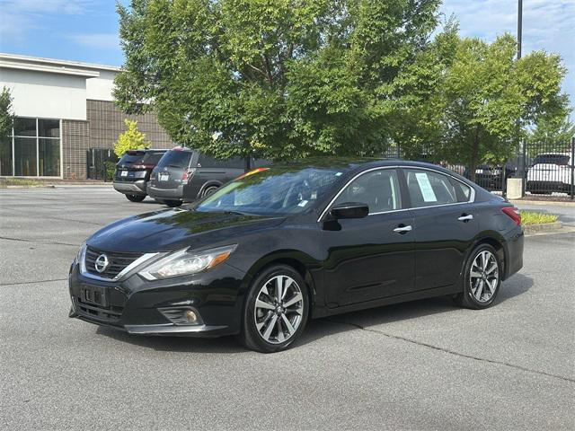 Photo of 2016 Super Black Nissan Altima
