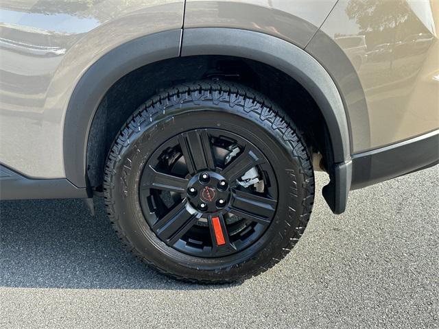 Photo of 2025 Baja Storm Metallic Nissan Rogue