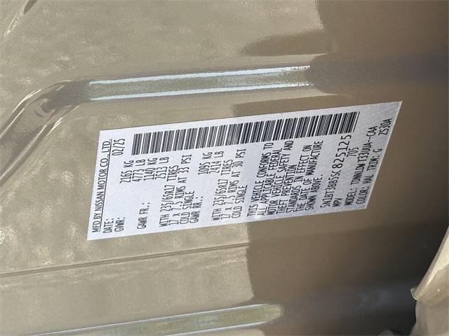 Photo of 2025 Baja Storm Metallic Nissan Rogue