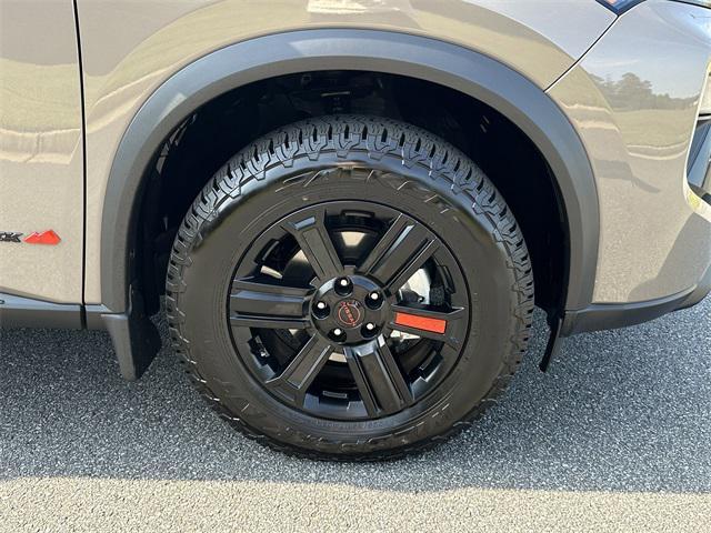 Photo of 2025 Baja Storm Metallic Nissan Rogue