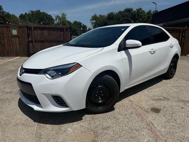Photo of 2016 Super White Toyota Corolla