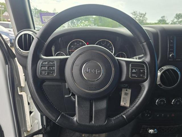 Photo of 2016 Bright White Clearcoat Jeep Wrangler Unlimited
