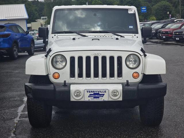 Photo of 2016 Bright White Clearcoat Jeep Wrangler Unlimited