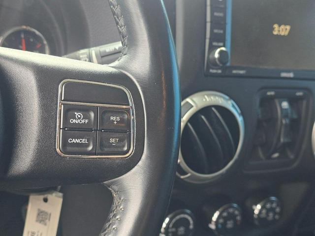 Photo of 2016 Bright White Clearcoat Jeep Wrangler Unlimited