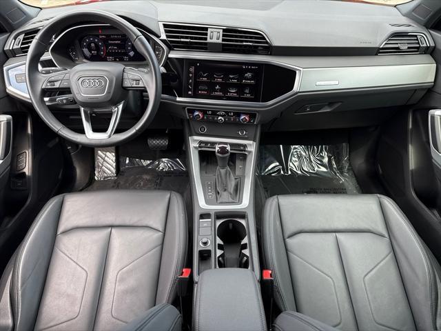 Photo of 2024 Progressive Red Metallic Audi Q3