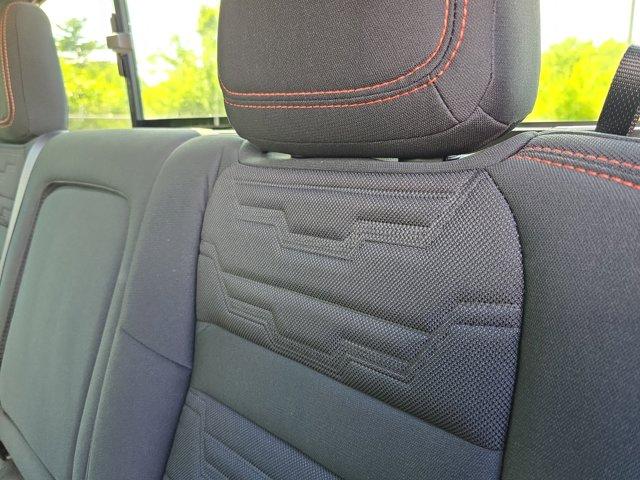 Photo of 2025 Afterburn Orange Nissan Frontier