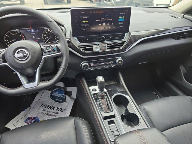 Photo of 2023 Pearl White Tricoat Nissan Altima