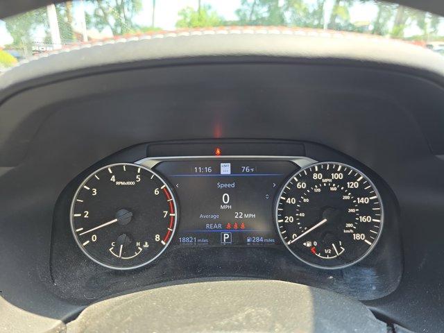 Photo of 2023 Pearl White Tricoat Nissan Altima