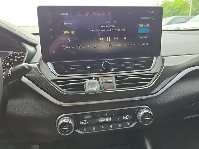 Photo of 2023 Pearl White Tricoat Nissan Altima