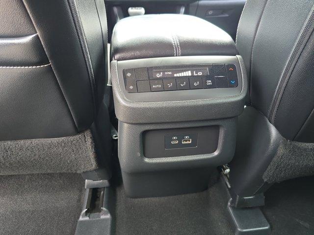 Photo of 2024 Obsidian Green Pearl/Super Black Nissan Pathfinder