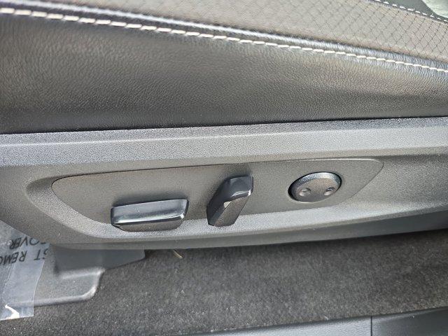 Photo of 2024 Obsidian Green Pearl/Super Black Nissan Pathfinder