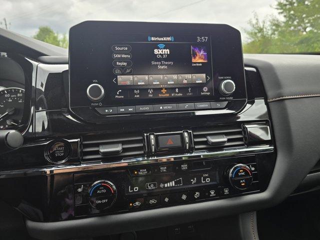 Photo of 2025 Scarlet Ember Tintcoat Nissan Pathfinder
