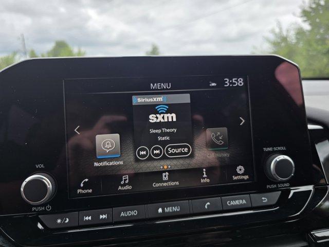 Photo of 2025 Scarlet Ember Tintcoat Nissan Pathfinder
