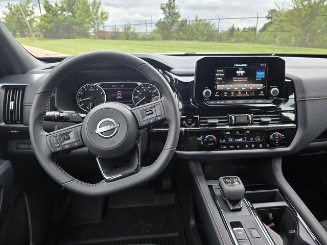 Photo of 2025 Scarlet Ember Tintcoat Nissan Pathfinder