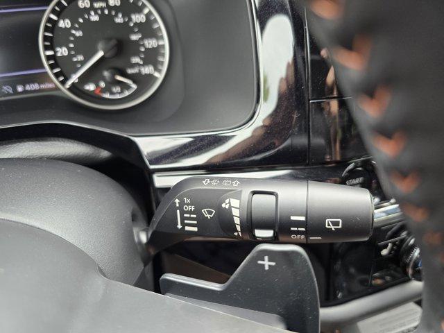 Photo of 2025 Scarlet Ember Tintcoat Nissan Pathfinder