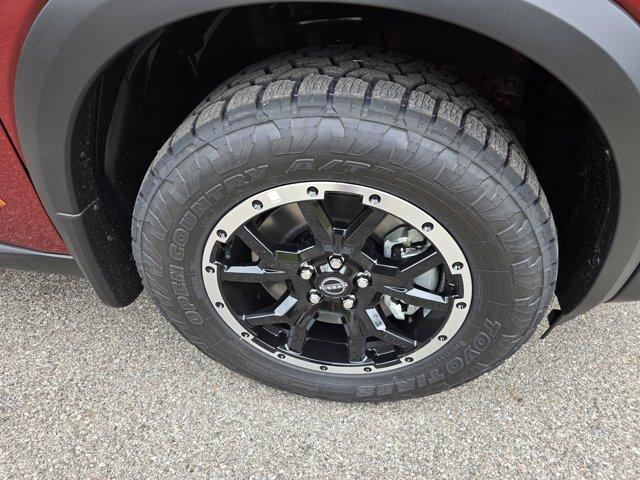 Photo of 2025 Scarlet Ember Tintcoat Nissan Pathfinder