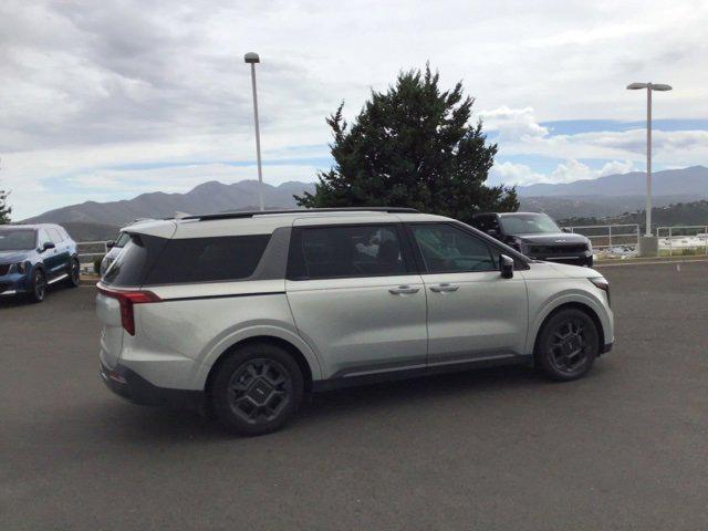 Photo of 2025 Ivory Silver Kia Carnival