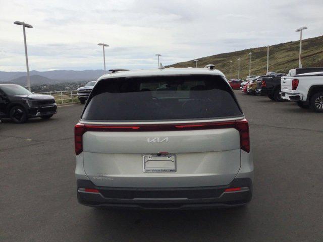 Photo of 2025 Ivory Silver Kia Carnival