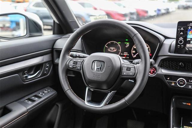 Photo of 2025 Radiant Red Metallic Honda CR-V Hybrid