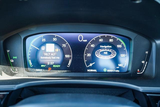 Photo of 2025 Solar Silver Metallic Honda Civic Hybrid