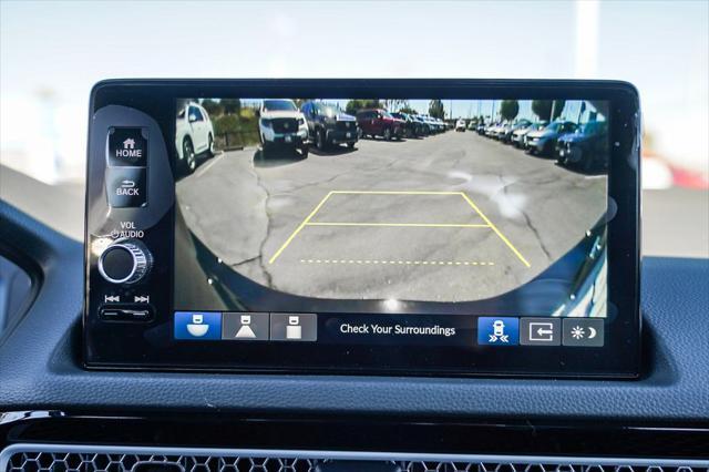 Photo of 2025 Solar Silver Metallic Honda Civic Hybrid