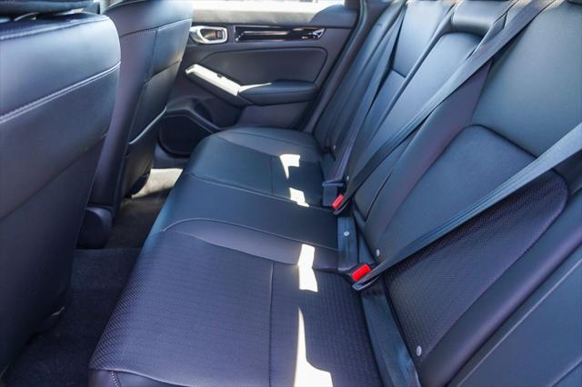 Photo of 2025 Solar Silver Metallic Honda Civic Hybrid