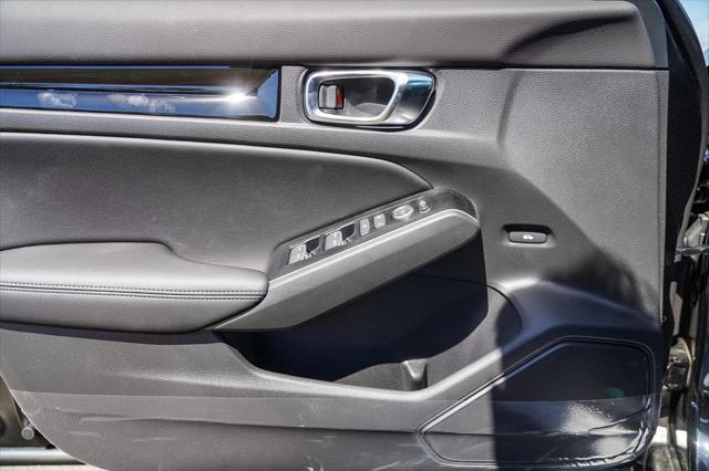 Photo of 2025 Solar Silver Metallic Honda Civic Hybrid