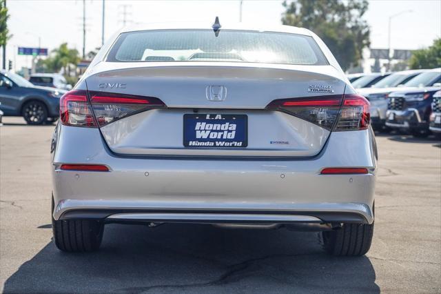 Photo of 2025 Solar Silver Metallic Honda Civic Hybrid