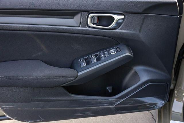 Photo of 2025 Boost Blue Pearl Honda Civic