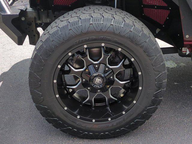 Photo of 2021 Snazzberry Pearlcoat Jeep Wrangler Unlimited