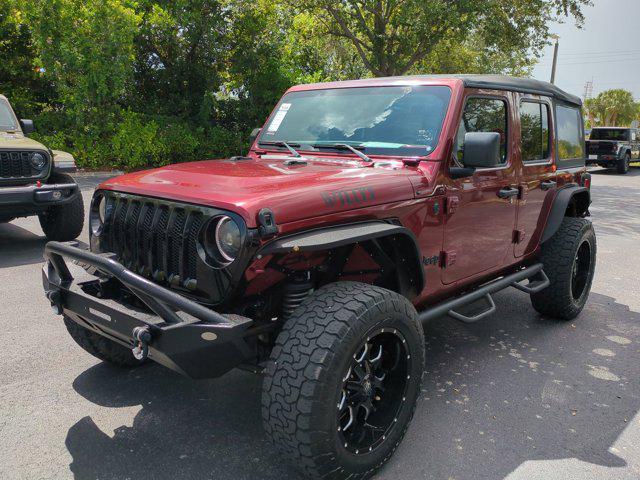 Photo of 2021 Snazzberry Pearlcoat Jeep Wrangler Unlimited